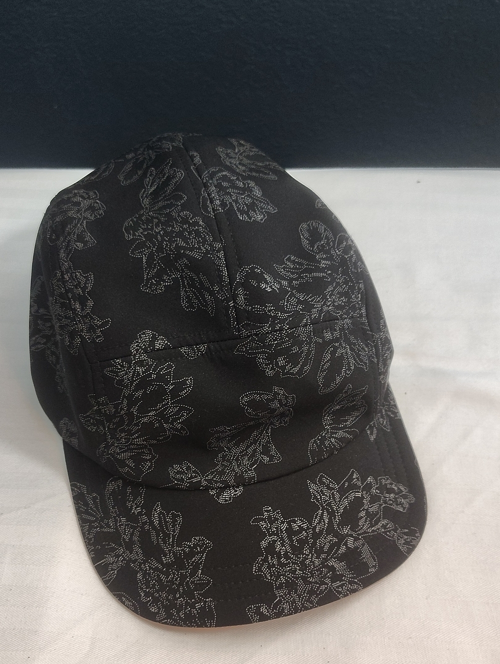 Athleta Adjustable Cold Weather Black Cap with Silver Floral Stitching